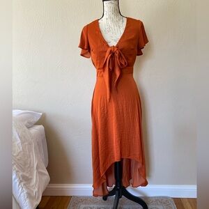 Burnt orange silky satin smooth dress with zipper back. Perfect for autumn!